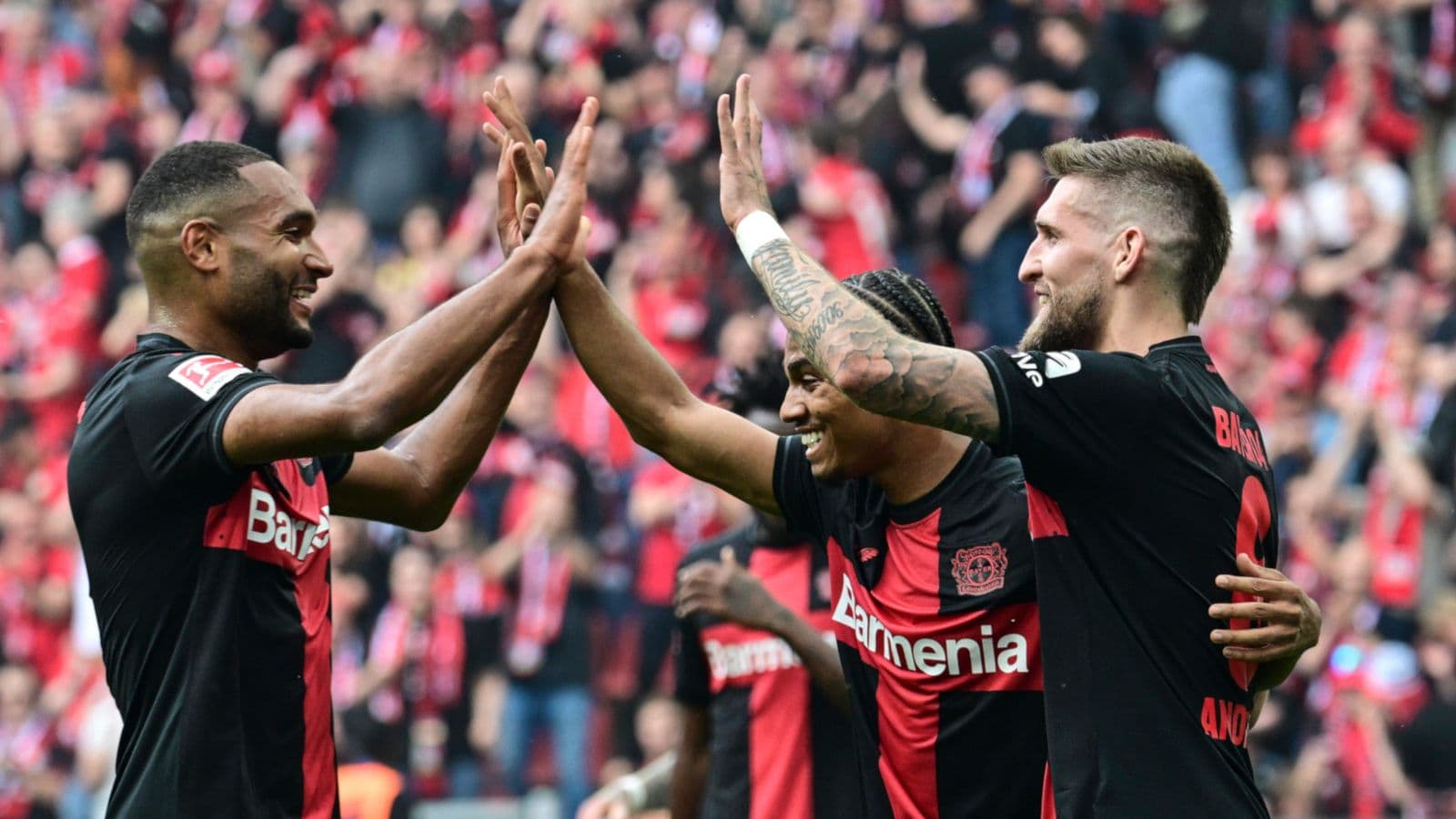 Leverkusen's winning streak meets Dortmund's home fortress in Bundesliga clash