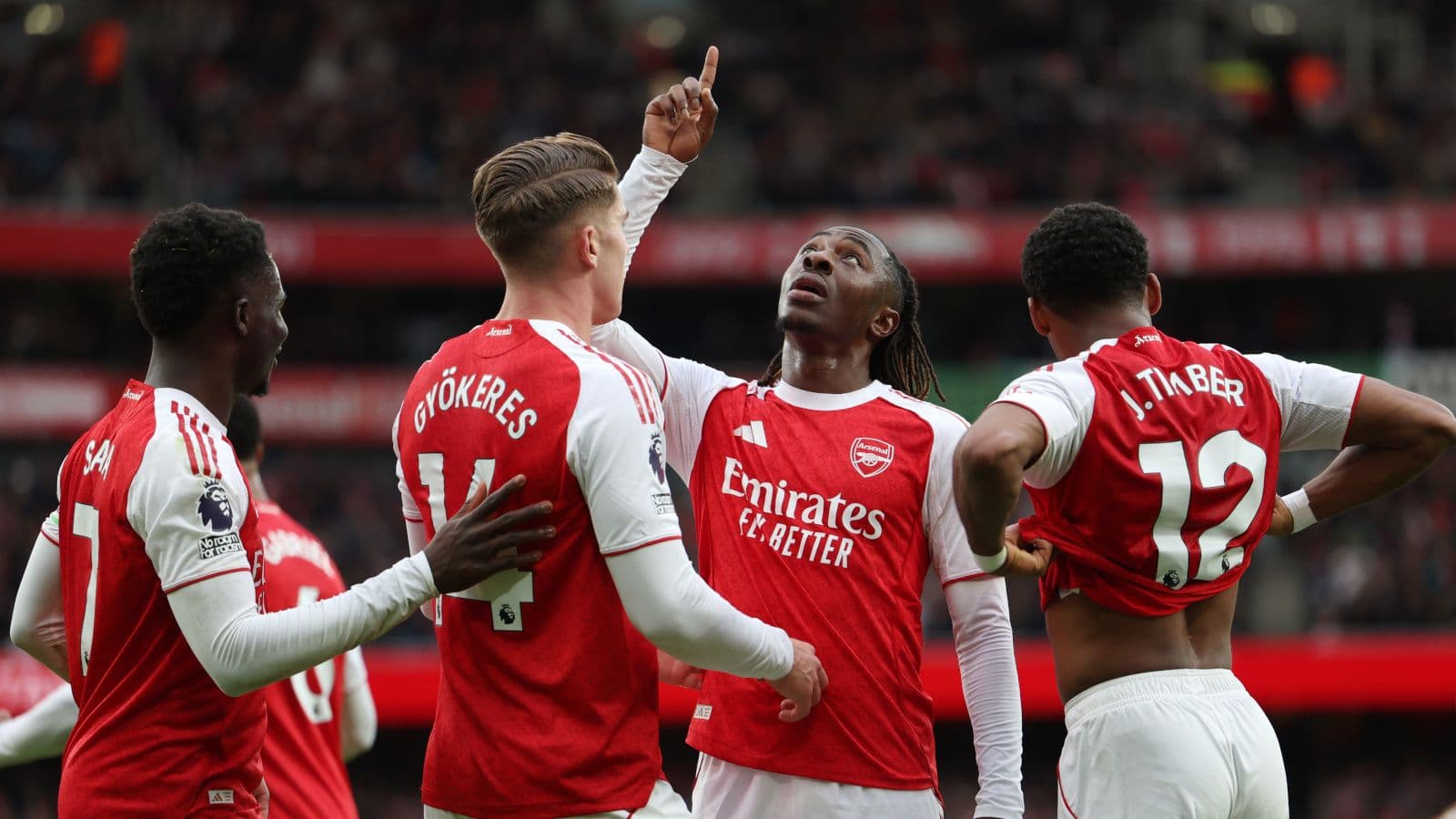 Arsenal put four goals past neighbours Tottenham Hotspur to keep Premier League hopes alive