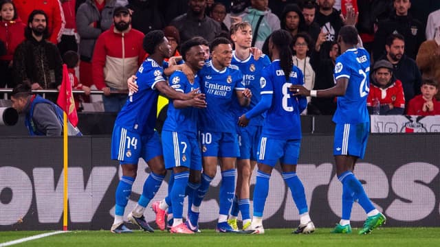 champions-league-real-madrid-edge-out-benfica-as-vinicius-junior-nets-winner