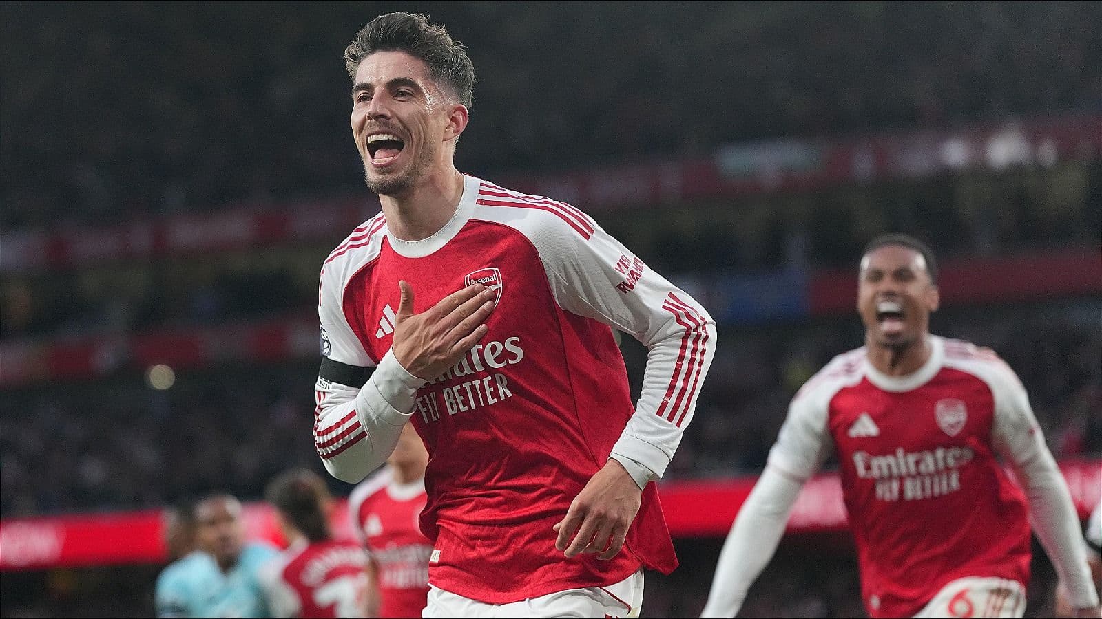 Arsenal keep title dream alive with tight Burnley victory