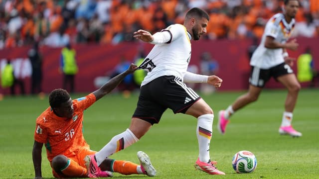 undav-brace-helps-germany-sink-ivory-coast-in-tense-fifa-world-cup-clash